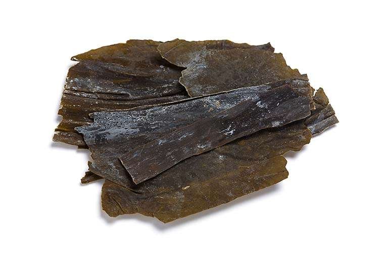 Dried kombu kelp seaweed, a type of edible seaweed.